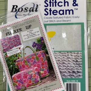 May include: A Bosal Stitch & Steam package featuring instructions for creating textured fabric, alongside an Aunties Two Pucker Up pattern packet. The Pucker Up pattern displays a floral tote and accessory bag with dimensions of 14 inches by 6 inches by 12 inches and 11 inches by 4 inches by 6 inches.