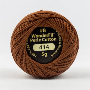 May include: A brown ball of WonderFil Perle Cotton thread, size #8, color 414, 5g. The label is black with gold lettering and says "WonderFil Perle Cotton" and "100% Egyptian Gassed & Merceized".