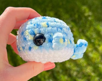 Crocheted whale made of chenille yarn with safety eyes; available in a variety of colors; perfect gift for children as a lucky charm