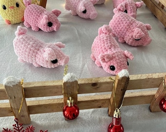 Crocheted lucky pig made of chenille wool with safety eyes; perfect lucky charm
