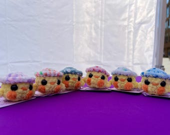 Crocheted chick with hat made of chenille wool with safety eyes; perfect addition to the Easter basket