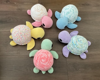 Crocheted turtles made of chenille yarn with safety eyes; various colors; perfect gift for children