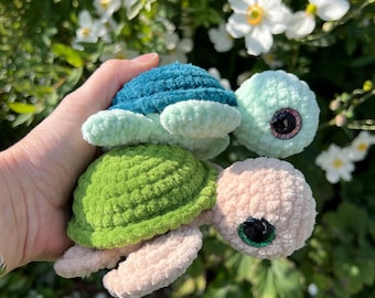 Crocheted baby turtle made of chenille yarn with safety eyes; available in a variety of colors; perfect gift for children