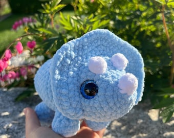 Crocheted triceratops made of chenille yarn with safety eyes; A loyal companion for all ages; Perfect gift for any age
