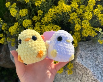 Crocheted chick made of chenille yarn with safety eyes; perfect gift for children as a lucky charm.
