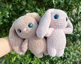 Crocheted bunny made of chenille yarn with safety eyes; available in a variety of colors; perfect gift for children as a lucky charm