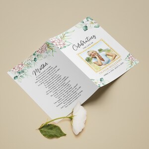 May include: A folded funeral program with a watercolor floral design and a photo of a woman. The program includes the text "Celebrating the Life of Olivia Williams April 4, 1954 - July 9, 2020" and a poem titled "Mother".