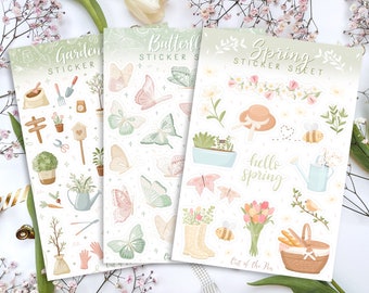 May include: Three sticker sheets with a spring theme. The first sheet features a garden theme with images of gardening tools, plants, and a watering can. The second sheet features butterflies in various colors and patterns. The third sheet features spring-themed images such as a hat, flowers, a watering can, a bee, and a basket of bread. The text on the sheets reads "Garden Sticker", "Butterfly Sticker Sheet", and "Spring Sticker Sheet".