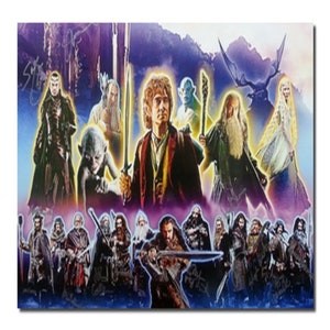 May include: A poster featuring a collage of characters from a fantasy film. The image showcases various figures, including a hobbit holding a sword, and other characters with swords and staffs. The background has a purple and blue gradient.