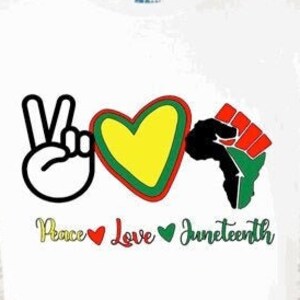 May include: White t-shirt with a peace sign, heart, and fist graphic. The text "Peace Love Juneteenth" is printed below the graphic.