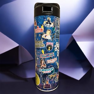 May include: A stainless steel travel mug with a black lid and a blue background covered in stickers. The stickers feature various images and text, including "Coffee & Contemplation", "Scoops Ahoy", and "Starcourt Mall".