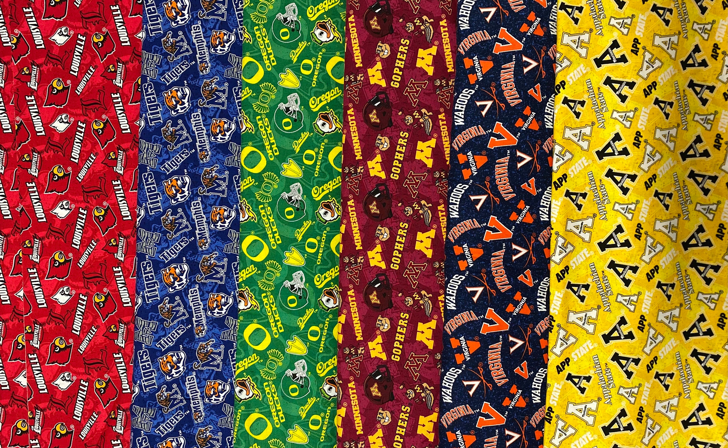 Fields Fabrics Cotton University of North Carolina Tar Heels Logos Blue Tone on Tone NCAA College Sports Team Cotton Fabric Print by The Yard