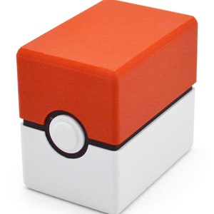 This box contains pokemon cards in a red and white Pokeball style design. This is a storage container for pokemon cards and small valuables.