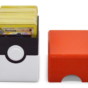 This box contains pokemon cards in a red and white Pokeball style design. This is a storage container for pokemon cards and small valuables.