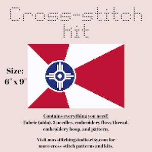 May include: Cross-stitch kit featuring a flag design. The flag is red, white, and blue, with a circular emblem in the center. The kit includes fabric, needles, floss, an embroidery hoop, and a pattern. The finished size is 6" x 9".