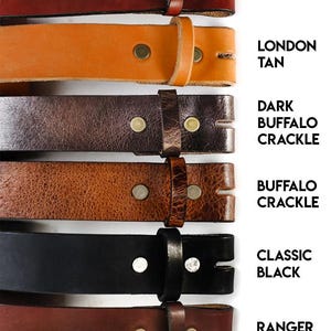 May include: Six leather belts in different colors and textures, including burnt umber, London tan, dark buffalo crackle, buffalo crackle, classic black, and ranger brown.