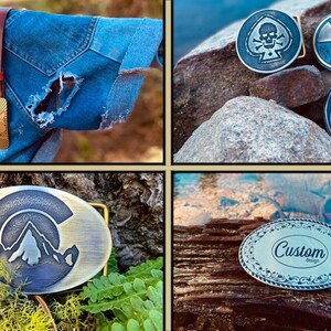 May include: Four different belt buckles with various designs. The first buckle is gold with a mountain scene. The second buckle is silver with a skull and crossbones. The third buckle is silver with a biohazard symbol. The fourth buckle is silver with the words "Custom Designs" in a decorative font.