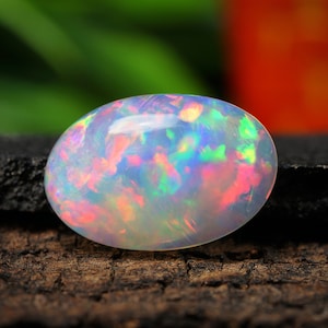 Ethiopian Opal Cabochon: 4.70 Carat Oval Gemstone, 17x11 MM