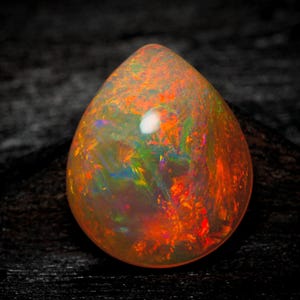 Natural Welo Opal Cabochon: Ethiopian Pear Shape Gemstone (7.00 Carat, 13x16 MM)