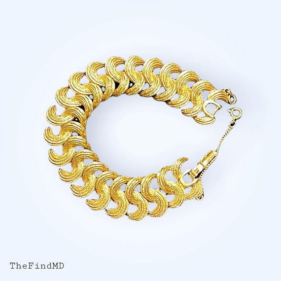 Monet  Gold Tone Swirl Link Bracelet - image 1