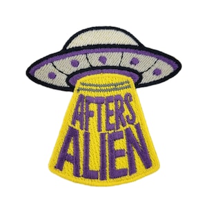 May include: Embroidered patch featuring a UFO design with the text "AFTER ALIEN." The UFO is white and purple, with a yellow beam of light emanating from it. The text is in purple.