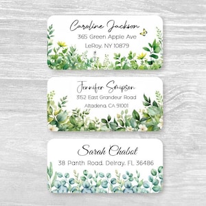 May include: Three rectangular address labels with white backgrounds and botanical illustrations. The top label features Caroline Jackson, 365 Green Apple Ave, LeRoy, NY 10879. The middle shows Jennifer Smipson, 3152 East Grandeur Road, Altadena, CA 91001. The bottom displays Sarah Chabot, 38 Panth Road, Delray, FL 36486.