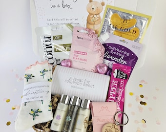 May include: A gift box containing a card with a bear illustration, 24K gold eye patches, coconut foot pack, pink clay mask, lavender self-warming eye mask, hot chocolate sachet, milk chocolate bar, floral socks, three small bottles, and a keychain.