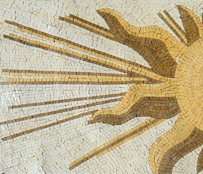 May include: A mosaic tile sun with a yellow and white color scheme. The sun has rays emanating from it, creating a decorative pattern.