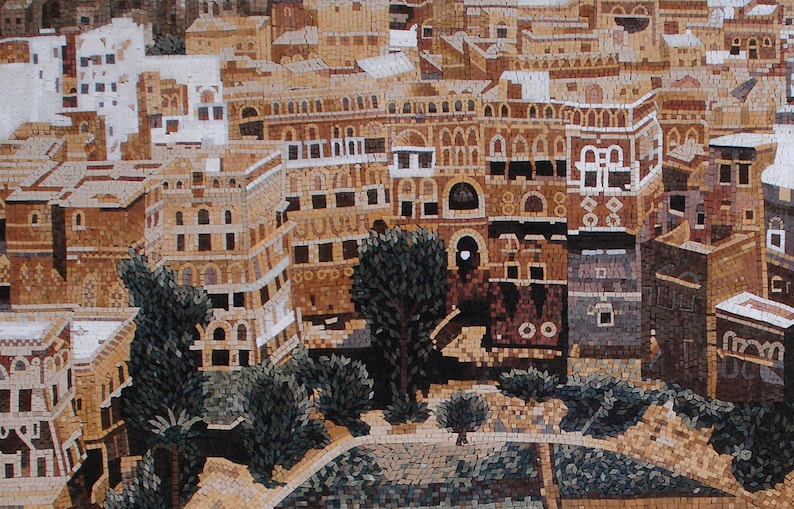 May include: A mosaic artwork depicting a cityscape with buildings, trees, and a courtyard. The buildings are made of small, colourful tiles and have a traditional Middle Eastern style. The trees are green and lush, and the courtyard is paved with stones.