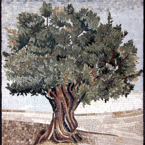 May include: A mosaic artwork depicting a large olive tree with a thick, gnarled trunk and a full canopy of green leaves. The tree is set against a background of a light gray sky and a brown, sandy ground.