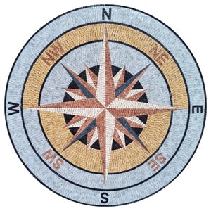 May include: A circular mosaic compass with a 16-point star design in shades of brown, white, and black. The compass points are labeled with the cardinal directions: N, S, E, W, NE, NW, SE, and SW.