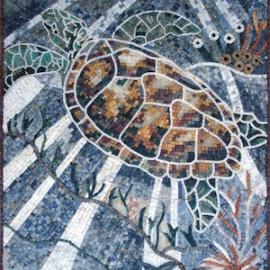 May include: A mosaic art piece depicting a sea turtle swimming through a blue and white underwater scene. The turtle is made of small, colorful tiles, and the background is made of blue and white tiles.