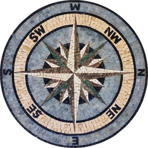 May include: A circular mosaic compass rose with a beige and blue background. The compass rose is made of small, colorful tiles and features the cardinal directions: N, S, E, W, NE, NW, SE, SW.