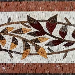 May include: Mosaic tile border featuring a floral design with brown, yellow, and burgundy leaves and berries on a white background. The border is framed by a reddish-brown and white mosaic pattern.