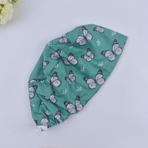 Butterflies on Green Euro Scrub Cap for Women, Ponytail scrub cap, Surgical cap Satin Lined Option, Satin Lined cap. scrub cap in 3 STYLES.