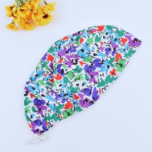 Floral ponytail scrub cap, Euro-style scrub cap, Regular scrub caps, Summer scrub cap with ponytail holder. Satin Lined Option.