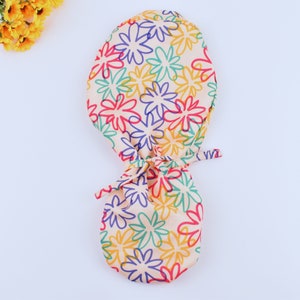 Summer Daisies Floral Ponytail scrub cap, Floral euro scrub cap, Summer scrub cap with ponytail holder, Satin Lined Option. Satin scrub cap.