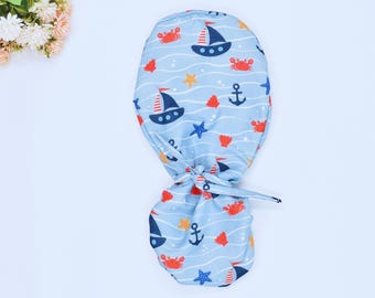 Sea Life Ponytail scrub cap, Surgical cap women. Satin Lined Option Surgical cap with ponytail. Sea Beauty Euro scrub caps.