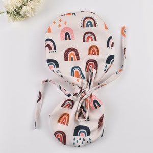 Rainbows Ponytail scrub cap, Surgical cap women. Surgical cap with ponytail, Scrub caps for women. Satin Lined scrub cap.