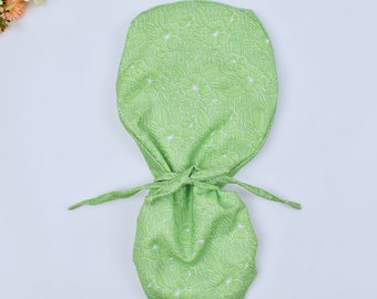 Green Floral Ponytail scrub cap, Surgical cap women. Satin Lined Option Surgical cap with ponytail. Satin Lined scrub cap.