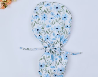 Blossoming floral Ponytail scrub cap, Surgical cap women. Satin Lined Option Surgical cap with ponytail.. Satin Lined scrub caps.