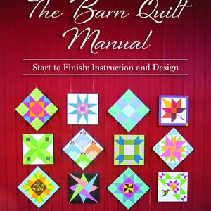 May include: The Barn Quilt Manual book cover features a red barn siding background with 12 colorful quilt squares. The title is "The Barn Quilt Manual" with the subtitle "Start to Finish: Instruction and Design". The author is Sheila Sinclair Snyder.