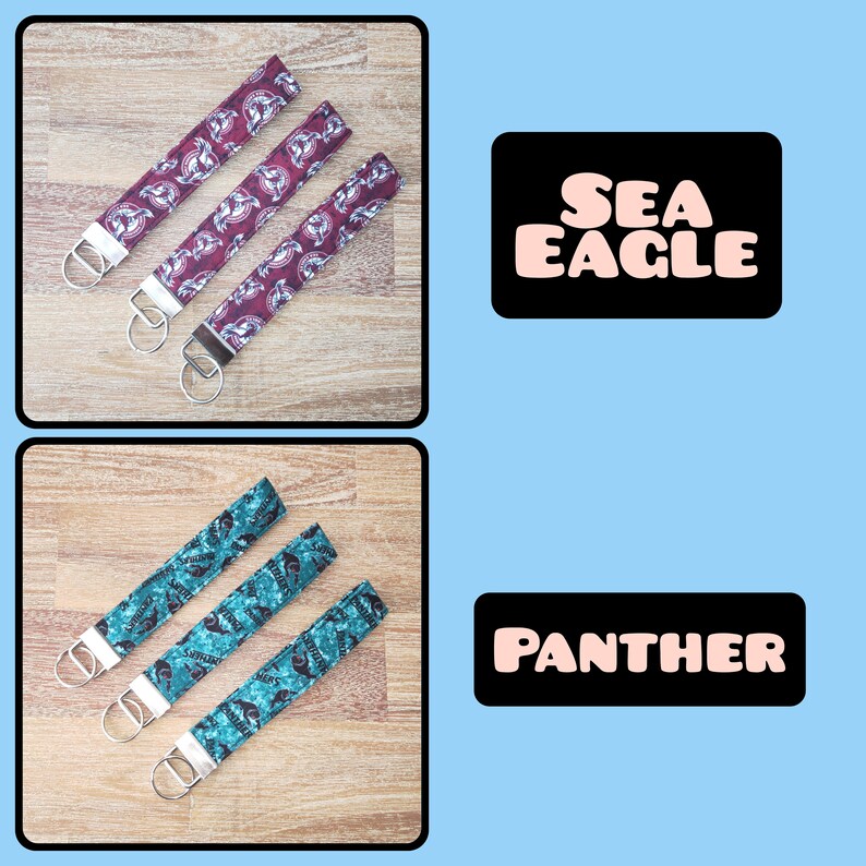May include: Three keychains with different designs. The top row features three red and white keychains with a sea eagle design. The bottom row features three teal and white keychains with a panther design. The text "SEA EAGLE" is printed on a black rectangle above the top row of keychains. The text "PANTHER" is printed on a black rectangle above the bottom row of keychains.