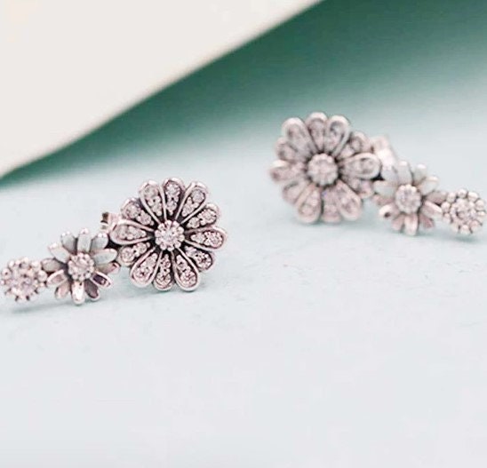 Sparkling daisy flower online trio stud earrings