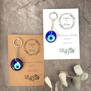 Hochzeit Gastgeschenke für Gäste in großen Mengen, personalisierte Dankeskarten, Blaues Glas Auge Schlüsselbund, Hochzeitseinladung, Schutzgeschenke