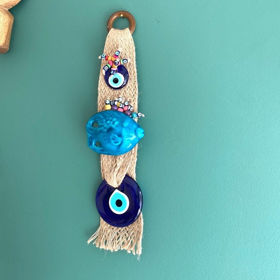 little dolphin evil eye on macrame cord little dolphin evil eye on macrame cord