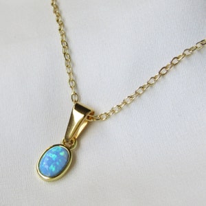 Bright Blue Lab-Created Opal Gold Pendant Necklace