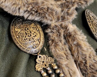 Pair of Viking tortoise brooches and beads, Viking jewellery