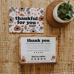 May include: Two rectangular cards with autumn-themed illustrations of pumpkins, mushrooms, and leaves. The top card reads "thankful for you" in bold black text. The bottom card features "thank you for supporting my small business" text.