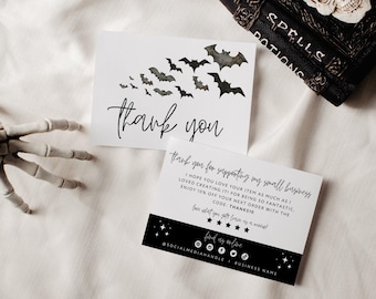 May include: Two white rectangular thank you cards. The top card features black watercolor bats and the text thank you. The bottom card includes text thanking the customer for supporting a small business, a 10% discount code, five stars, and social media icons.